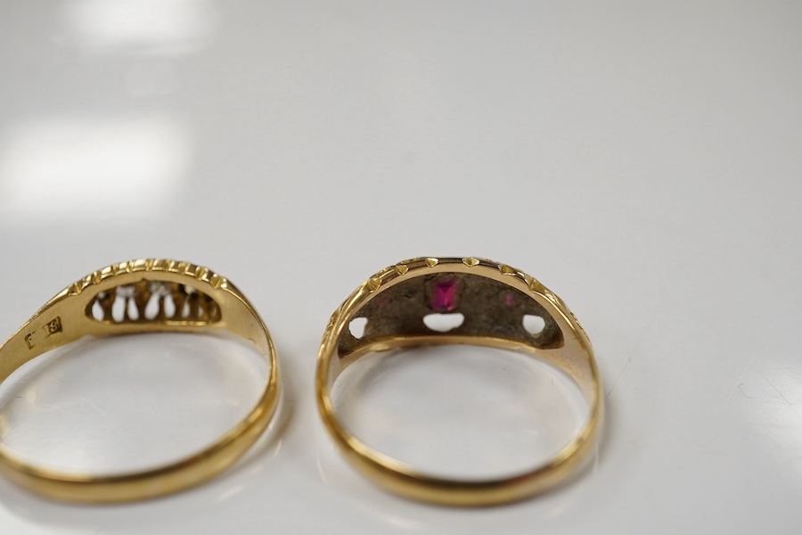 An early 29th century 18ct gold, ruby and diamond set ring, size M and a similar 18ct and graduated five stone diamond chip set ring, gross weight 5.1 grams. Condition - poor